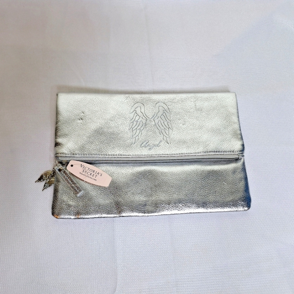 NWT Victoria's Secert " The Angle in Metallic Platinum" Fold over clutch purse.
